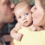 Proud Parents Holding Baby in the bedroom - ИА SakhaLife.Ru