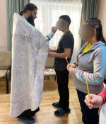 В реабилитационном центре села Кангалассы совершено Таинство Крещения